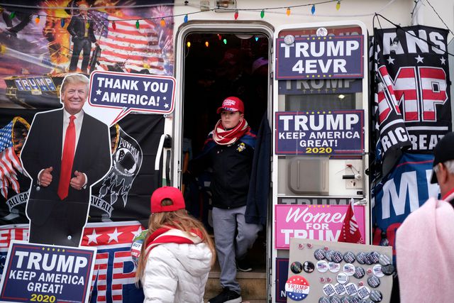 Trevor Horn, 12, checks out an RV full of President Donald Trump paraphernalia before the start of a rally in Wildwood, N.J